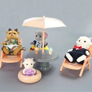 Umbrella table with 2 chairs, & float.